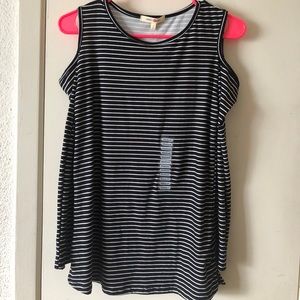 A long sleeved with cropped shoulders blouse